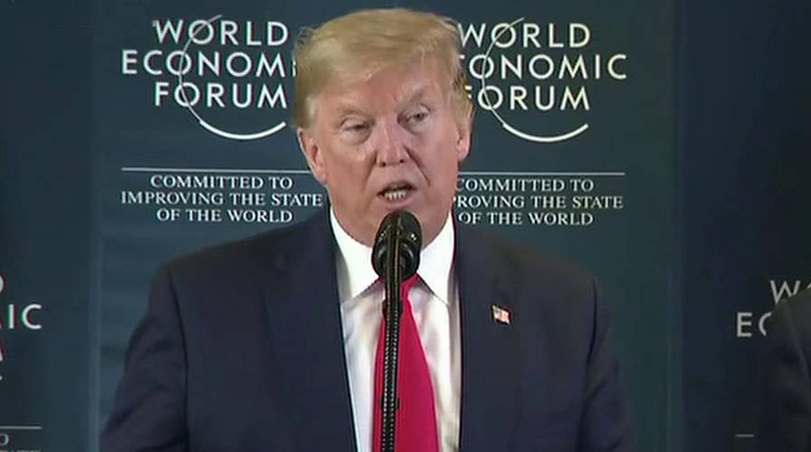 Trump wraps up Davos trip by slamming impeachment during press conference
