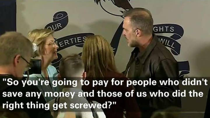 Elizabeth Warren confronted by angry voter