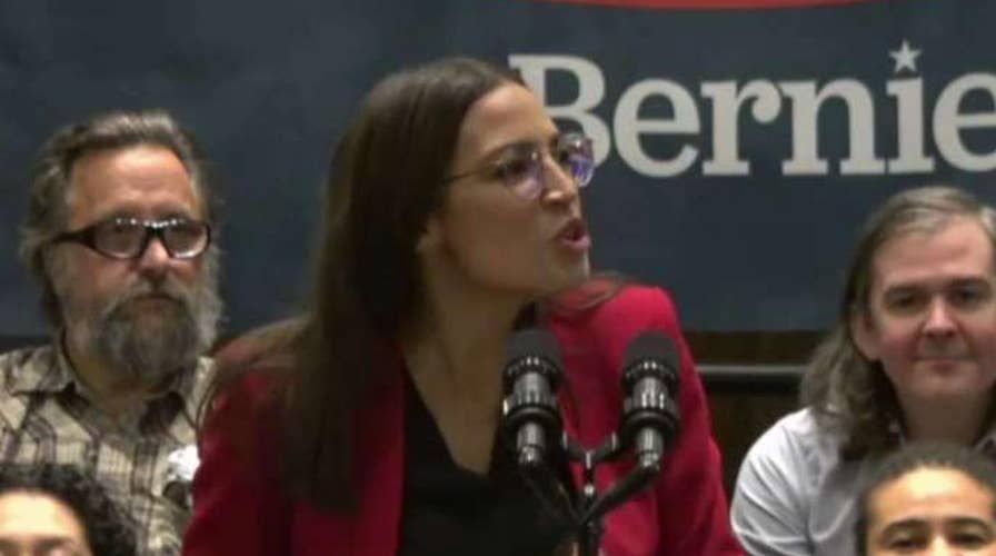 Michael Moore and AOC hold rally for Bernie Sanders in Iowa