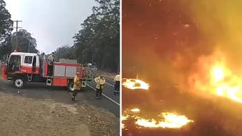 Australia wildfire overruns firefighters in minutes as 'day turns to night' in dramatic video