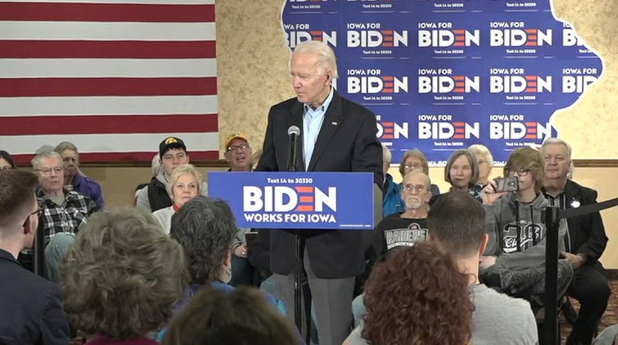 Democratic presidential hopeful Joe Biden talks with voters in Fort Madison, Iowa