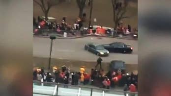 Kansas City police arrest 2 at Chiefs' champions parade after car drives through barricades 'headed for crowd'