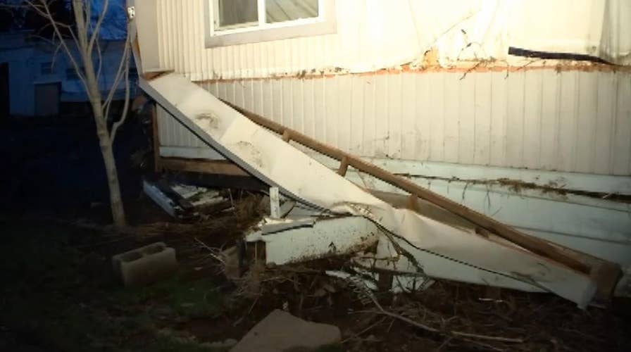 Oregon residents begin to assess the damage from deadly flooding