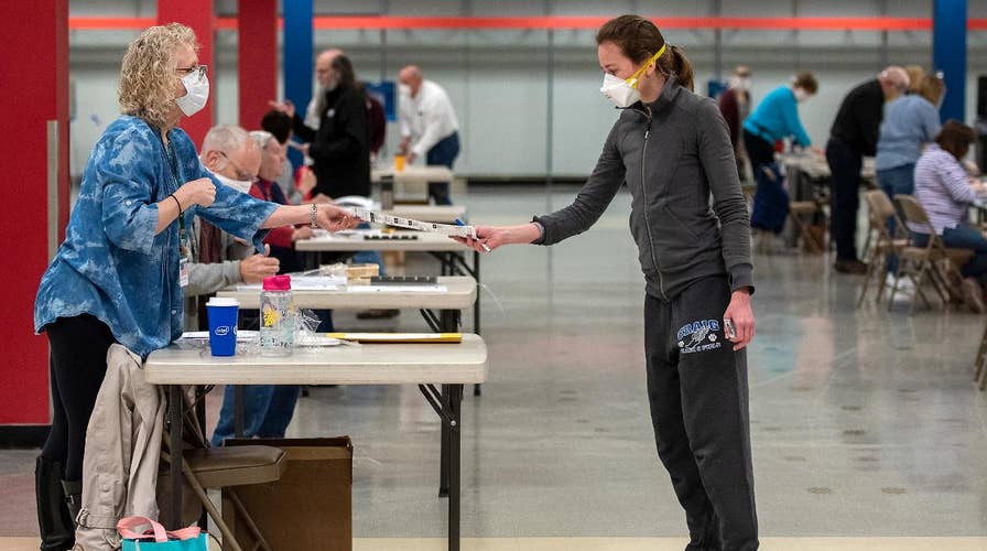 Wisconsin voters cast ballots amid the coronavirus pandemic