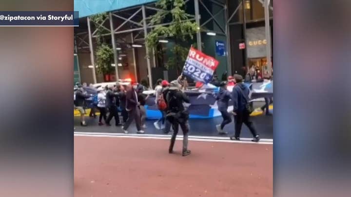 Trump supporters unveil massive banner in NYC
