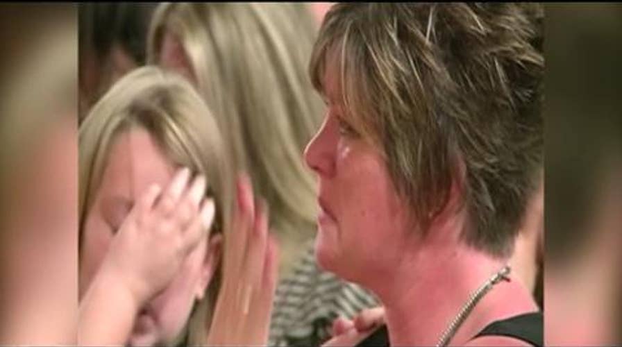 Fallen Navy SEAL’s Dog Refuses to Leave Master’s Side at Funeral