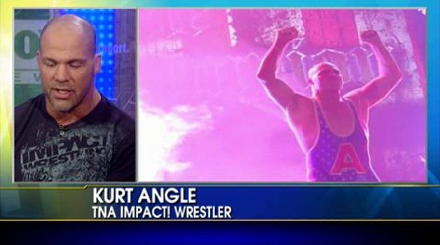 Fox and Friends Moment of the Day: Brian Kilmeade Gets Taken to the Mat By Pro Wrestler Kurt Angle!