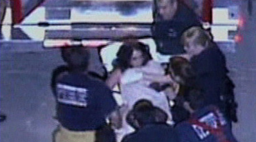 Britney Leaves Home in Ambulance