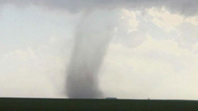 Tornadoes and hail slam the Midwest