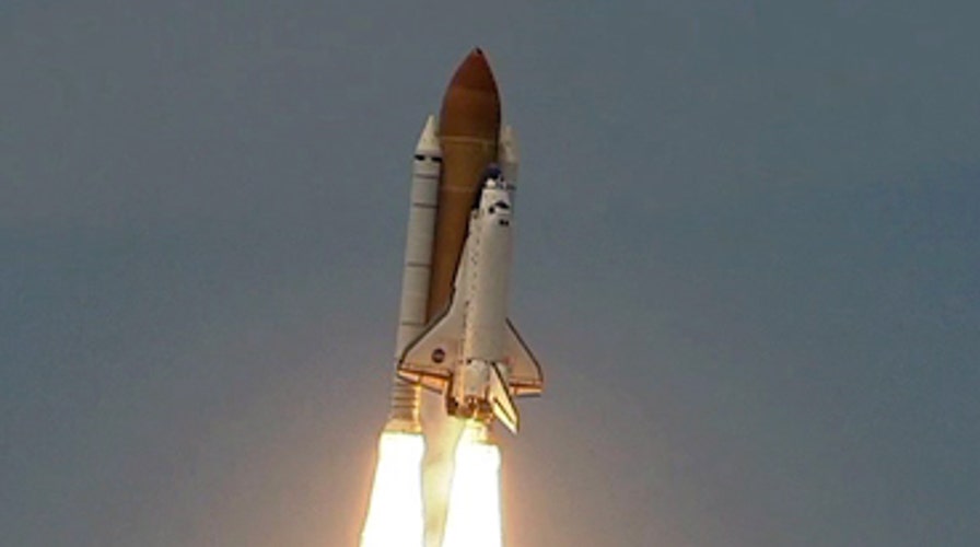 Shuttle Atlantis Blasts Off