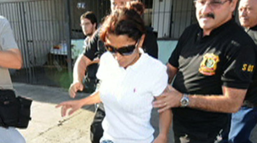 Boxer's Wife a Murderer?