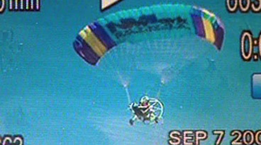 Parachuter Slams Into Crowd