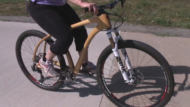 Entrepreneur crafts, sells wooden bicycles