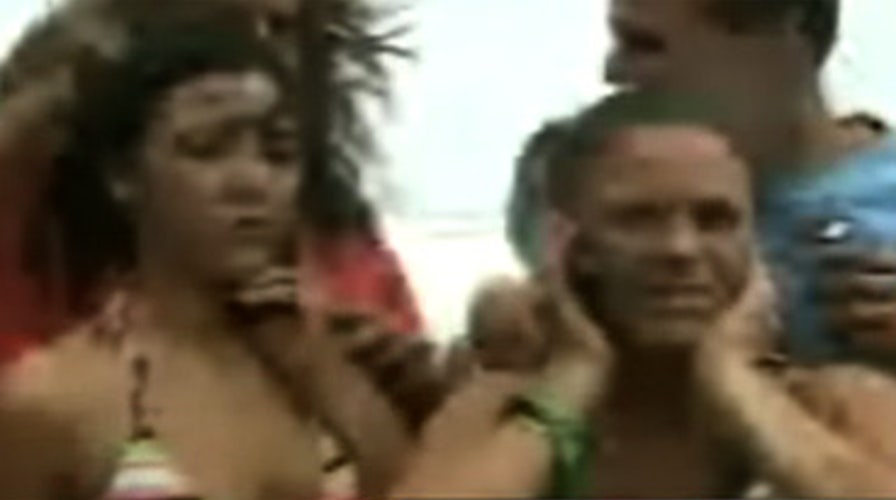 Bikini-Clad Partiers Ride Out Storm