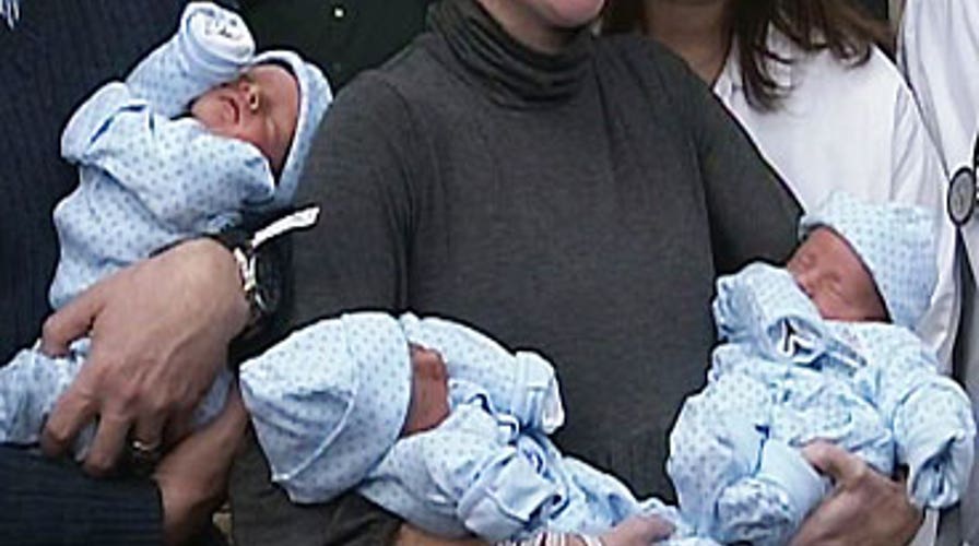 Identical Triplets Born