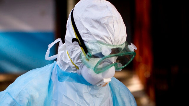 Calls for quarantine before travelers exit West Africa