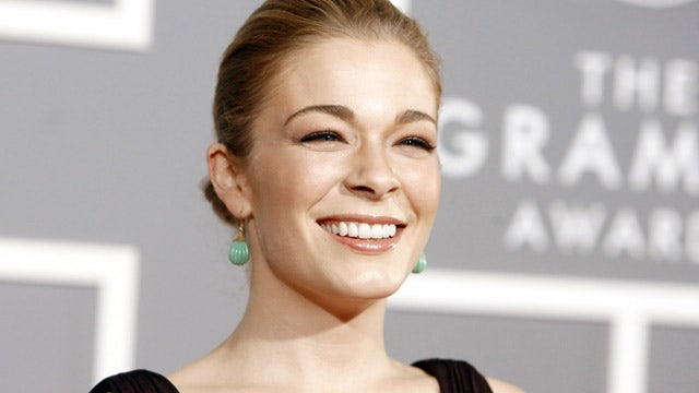 Can Rimes win a tabloid war?