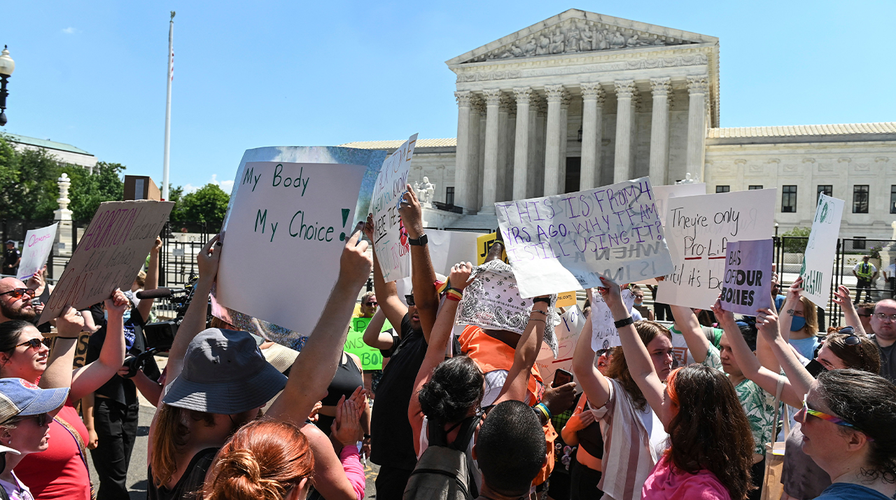 Protesters gather outside Supreme Court one day after reversal of Roe v. Wade