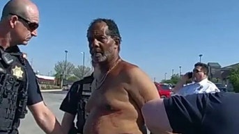 Black man charged with murdering two White strangers because of their race