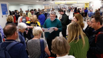 Thousands of passengers stranded as airlines point finger at FAA