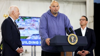 Fetterman greets Biden in hoodie and shorts before stumbling through remarks