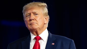 Justice Dept. moves to bar Trump from accessing certain documents without lawyer