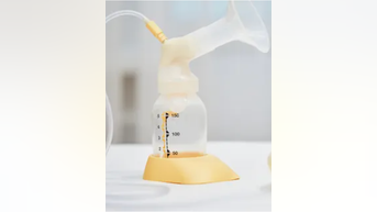 Men TAKE their TURN at 'breastfeeding'