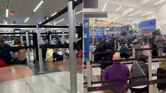 Chaos breaks out at country’s busiest airport as police officer among two people stabbed