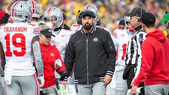 Ohio State bucked out of top rankings after devastating loss to arch rival Michigan
