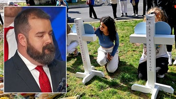 Hero police officer honored for response to school shooting leaves audience in tears