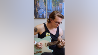 Man plays GUITAR in brain surgery