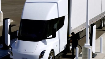 Tesla’s electric semi-truck takes on diesel big rig