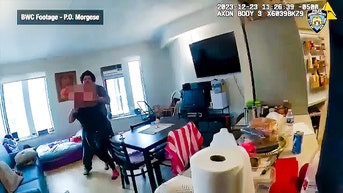 Man screaming about knife and holding mother in chokehold shot dead