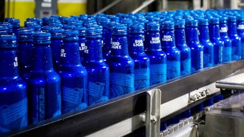 Bud Light continues to fight controversial sponsorship, taps new heavyweight