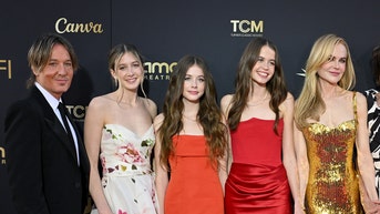 Daughters of A-list couple make their red carpet debut to show support for their mom