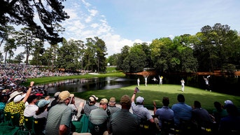 Golf's signature tournament turns from tradition to tech for fans of treasured major event