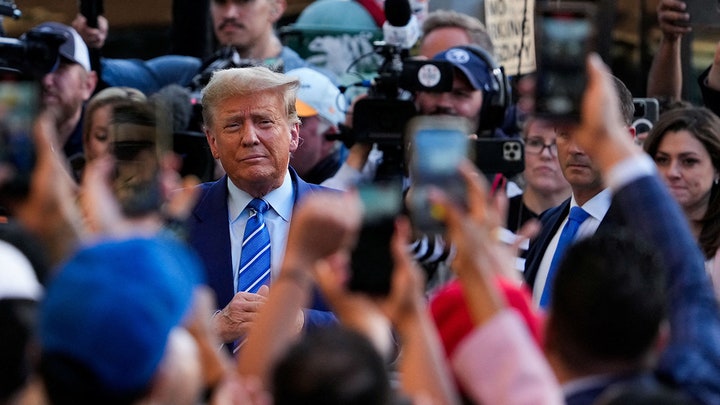Trump says criminal trial is having a 'reverse effect' as he campaigns outside NYC store