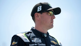 Furious father of NASCAR star attacks Kyle Busch during wild brawl that wiped out reporters