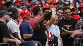 Black, Latino Trump supporters shut down reporter asking about 'racist' rhetoric
