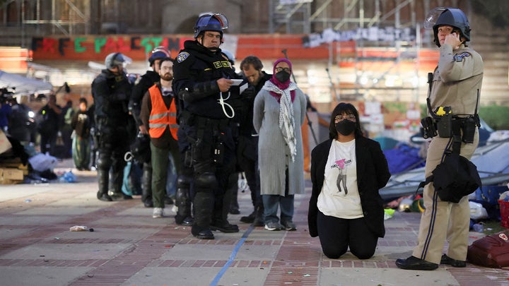 Police at UCLA haul away zip-tied anti-Israel agitators as violent mob dismantled