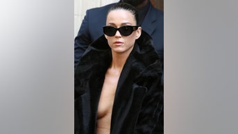Katy Perry goes nearly NAKED