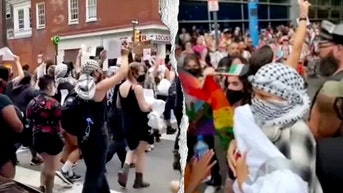 Anti-Israel mob confronts Pride parade, rainbow drummers forced to march in place