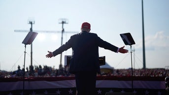 Man with range-finder at Trump rally spotted by officer 30 mins before shots, source says