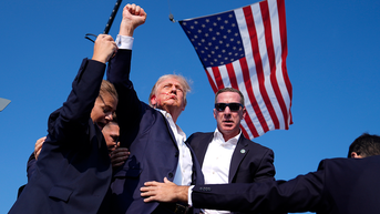 Photographer who captured 'iconic' image of Trump after shooting recounts how he got it