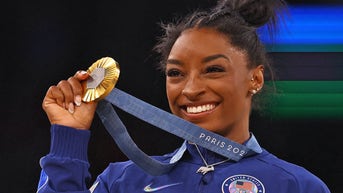 Simone Biles cements G.O.A.T. status after another stunning performance and historic gold - Fox News