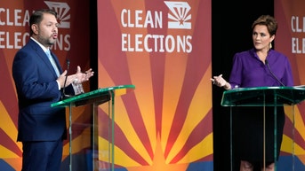 Ruben Gallego, Kari Lake clash over illegal immigration in heated debate - Fox News