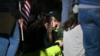 holding head - Fox News