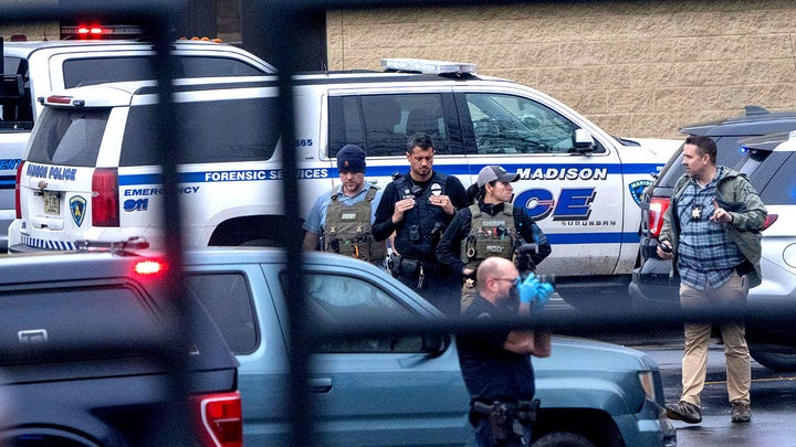 cop taking photo - Fox News