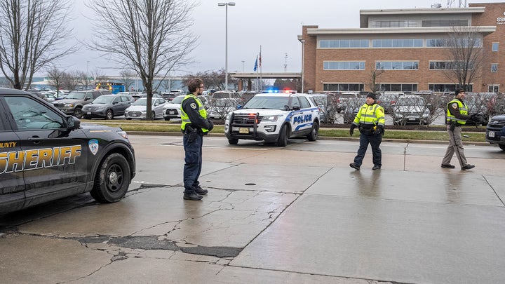 police in parking lot - Fox News