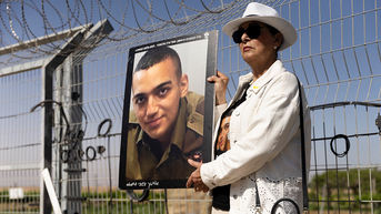 Woman holds photo of her grandson Eden Alexander - Fox News